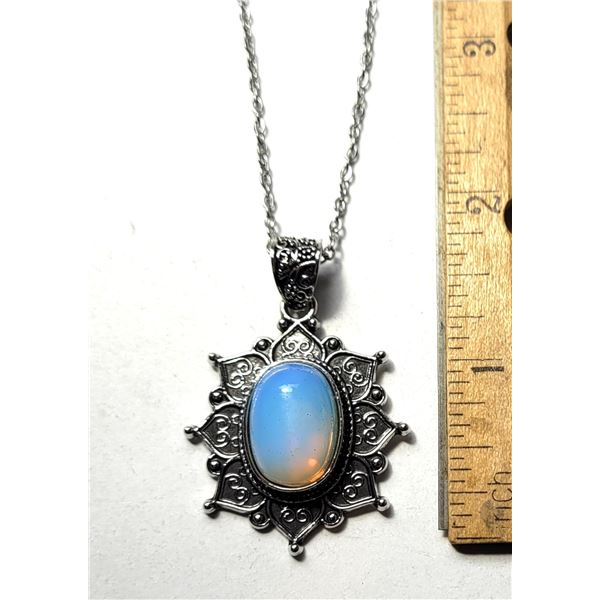 17)  BEZEL SET NATURAL OPALINE PENDANT