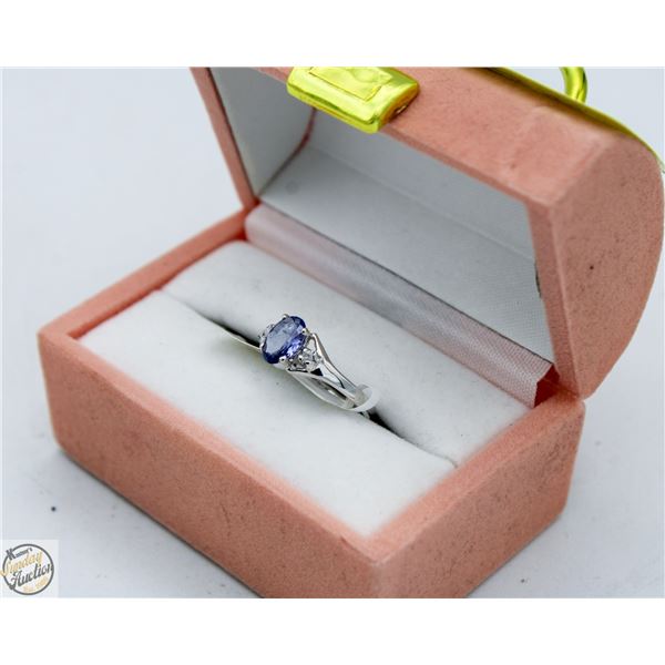 10K WHITE GOLD RING WITH 1 OVAL TANZANITE