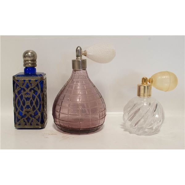 2 PERFUME BOTTLES WITH ATOMIZERS; PURPLE;