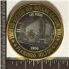 Image 1 : CASINO $10 SILVER TOKEN (UNC) FLAMINGO 1994