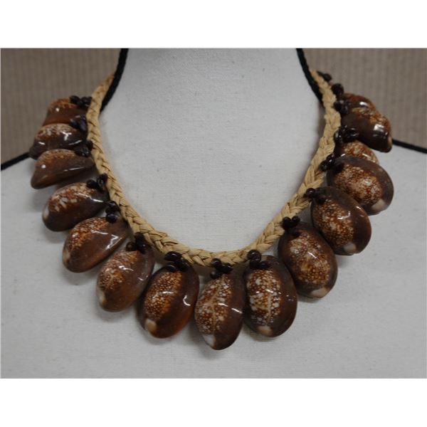Cowrie Shell Necklace on a Woven Cord Approx. 18"L