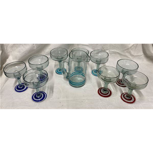 HAND-BLOWN MEXICAN GLASSWARE, INCLUDING SEVERAL MARGARITA GLASSES AND A PITCHER