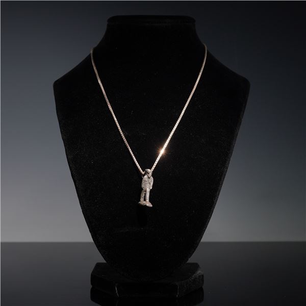 Metal Figure Pendant on Sterling Silver Necklace