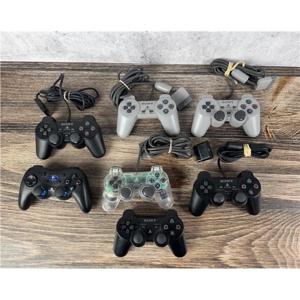Group Of Playstation Video Game Controllers