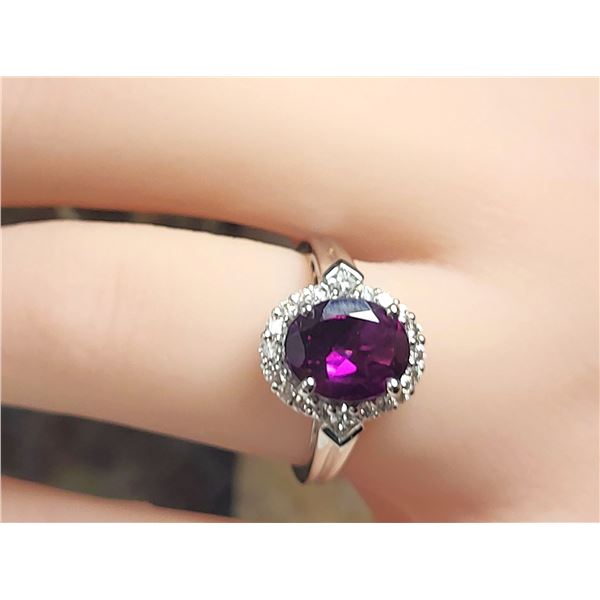 Bishop’s Garnet & Diamond Halo Ring