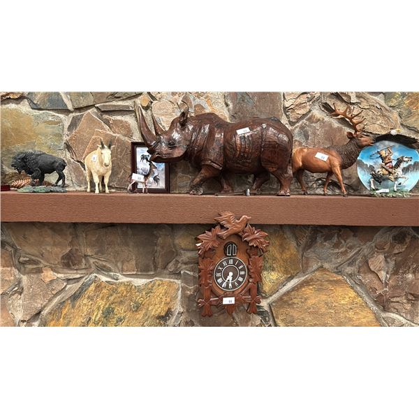 SHELF OF ORNAMENTS, CARVED FIGURES & CUCKOO CLOCK