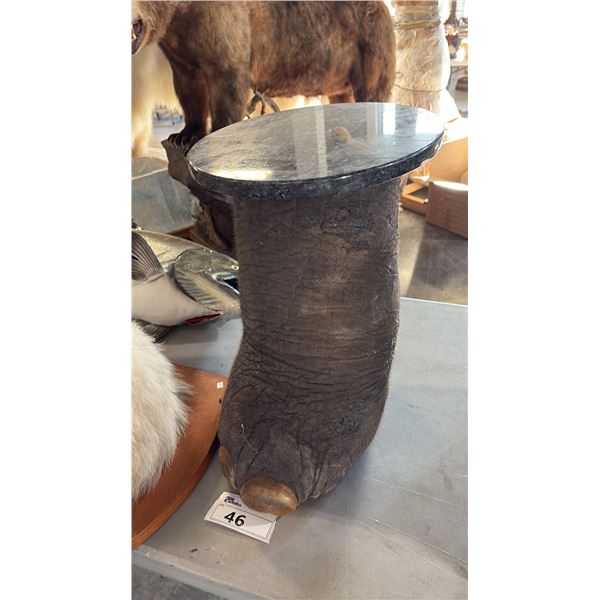GRANITE/ELEPHANT LEG TABLE WITH PAPERWORK