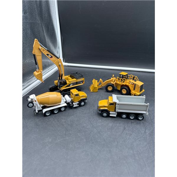 Lot of 4 Diecast CAT Construction Vehicles 1:64 Scale Including Excavator, Mixer, Loader, and Dump T