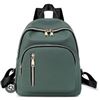 Image 1 : Green Backpack with Multiple Zippered Compartments and Adjustable Straps