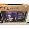 Image 2 : Halloween Ground Breaking Skeleton With Posable Arms and LED Eyes, 62 Inches Tall
