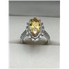 Image 1 : Marquise-Cut Yellow Gemstone Ring with Clear Stone Accents in Silver Setting