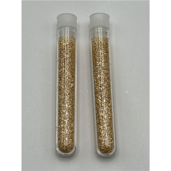 Two Clear Tubes Containing Gold Flake Material