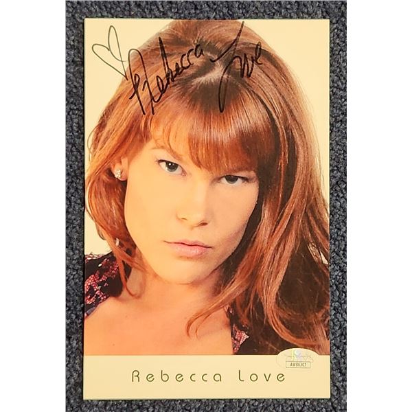 Rebecca Love signed 5.5” x 8.5” color photo with JSA authentication.