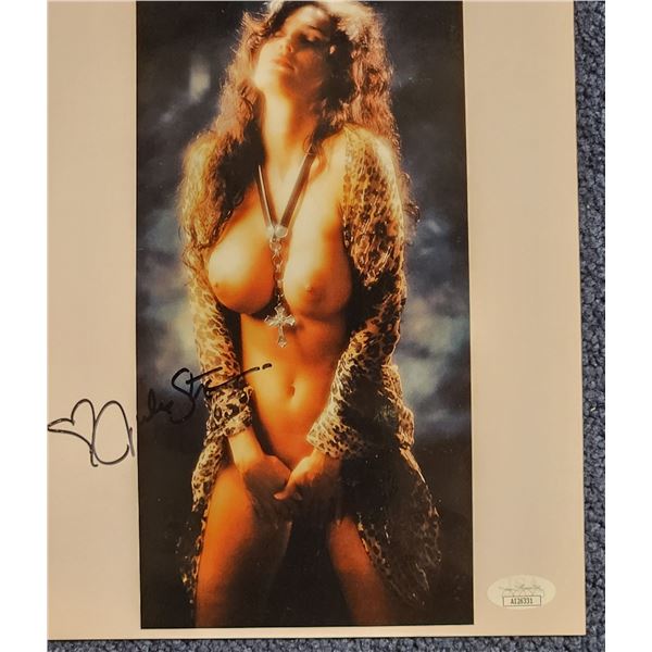 Julie Strain signed 8” x 10” color photo with JSA authentication.