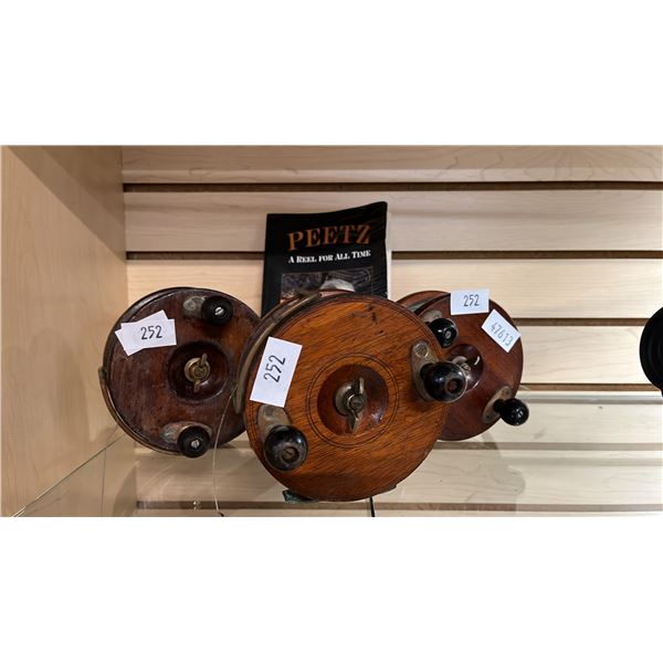 (3) ASSORTED VINTAGE PEETZ FISHING REELS & PEETZ REELS BOOK