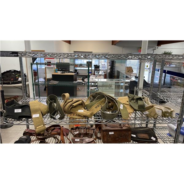 SHELF OF BELTS & GUN HOLSTERS