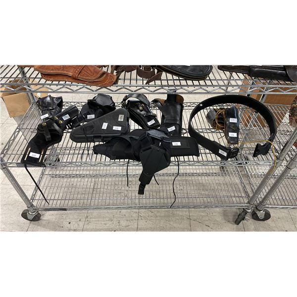 SHELF OF ASSORTED HOLSTERS & BELTS