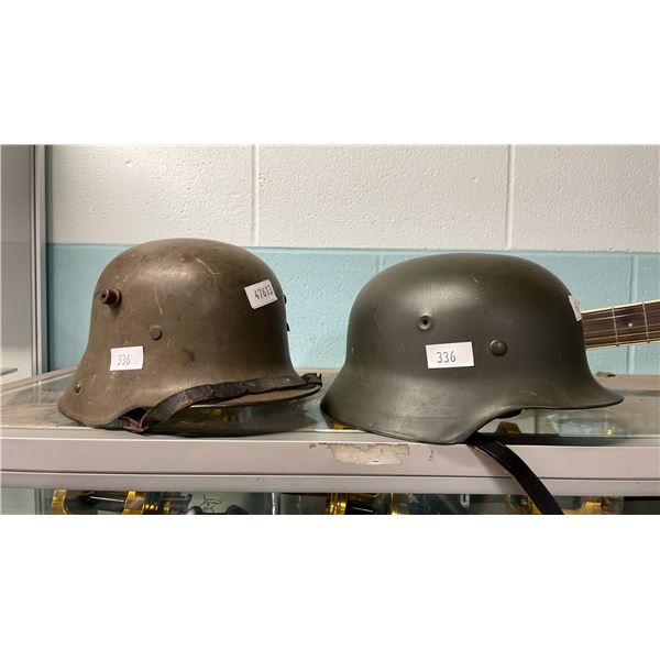 2 VINTAGE MILITARY HELMETS - 1 WITH LEATHER LINER