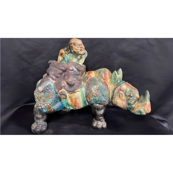 CHINESE SHIWAN CERAMIC STATUE OF A MAN RIDING A RHINOCEROS: 18"W X 14"T X 8"D