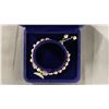 Image 2 : ADJUSTABLE PINK FRESHWATER PEARL BRACELET WITH FISH TAIL CHARM