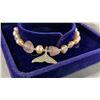 Image 3 : ADJUSTABLE PINK FRESHWATER PEARL BRACELET WITH FISH TAIL CHARM