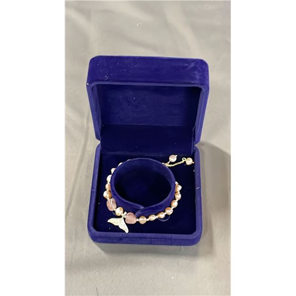ADJUSTABLE PINK FRESHWATER PEARL BRACELET WITH FISH TAIL CHARM