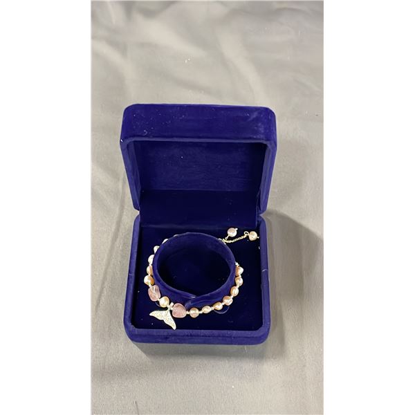 ADJUSTABLE PINK FRESHWATER PEARL BRACELET WITH FISH TAIL CHARM