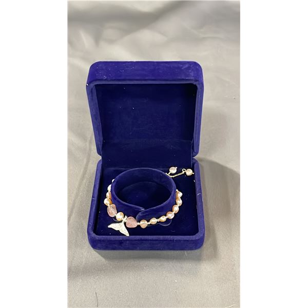 ADJUSTABLE PINK FRESHWATER PEARL BRACELET WITH FISH TAIL CHARM