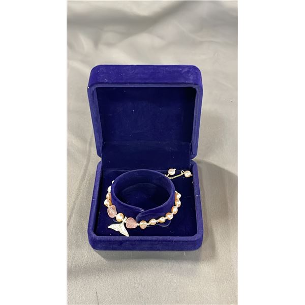 ADJUSTABLE PINK FRESHWATER PEARL BRACELET WITH FISH TAIL CHARM