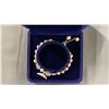 Image 2 : ADJUSTABLE PINK FRESHWATER PEARL BRACELET WITH FISH TAIL CHARM