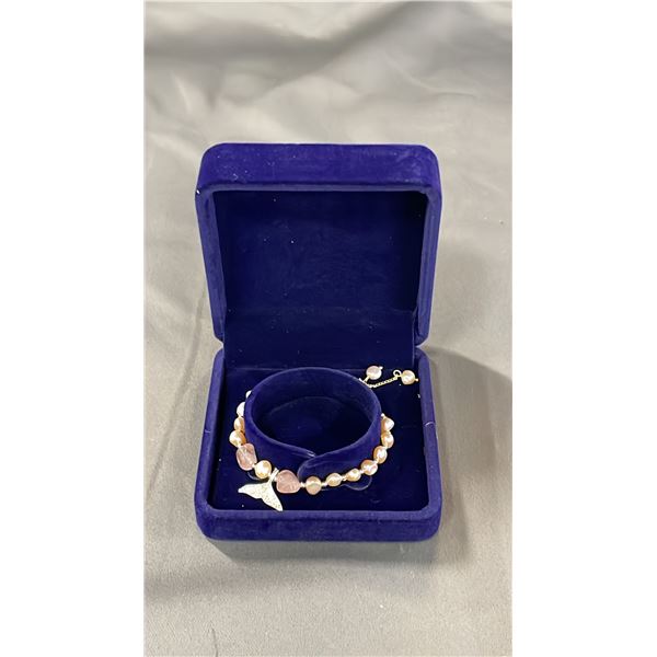 ADJUSTABLE PINK FRESHWATER PEARL BRACELET WITH FISH TAIL CHARM