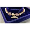 Image 3 : ADJUSTABLE PINK FRESHWATER PEARL BRACELET WITH FISH TAIL CHARM