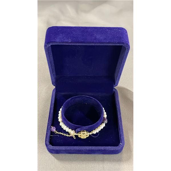 ADJUSTABLE FRESHWATER PEARL BRACELET WITH 4-LEAF CLOVER CHARM