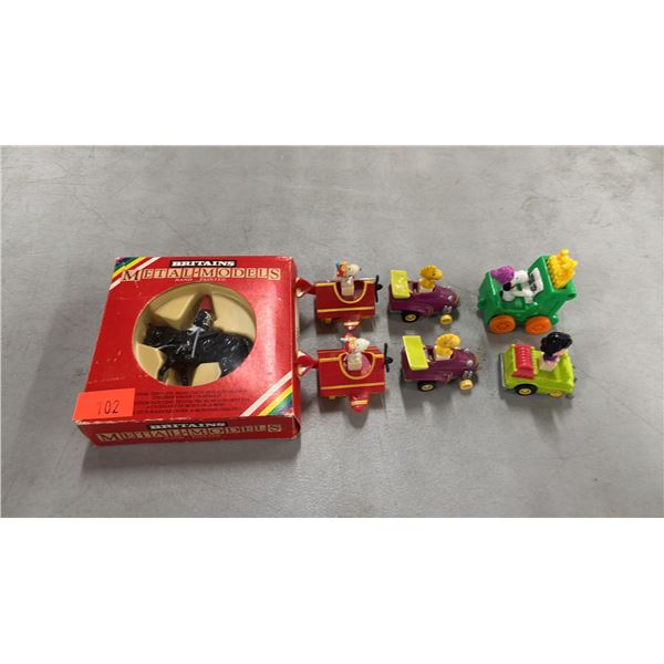 METAL MOUNTED HORSE GUARD FIGURINE & (6) ASSORTED "PEANUTS" TOYS