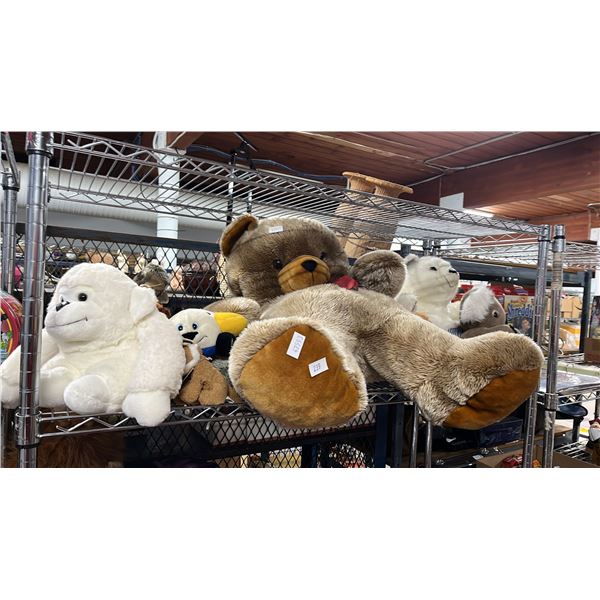 SHELF OF ASSORTED STUFFED ANIMALS
