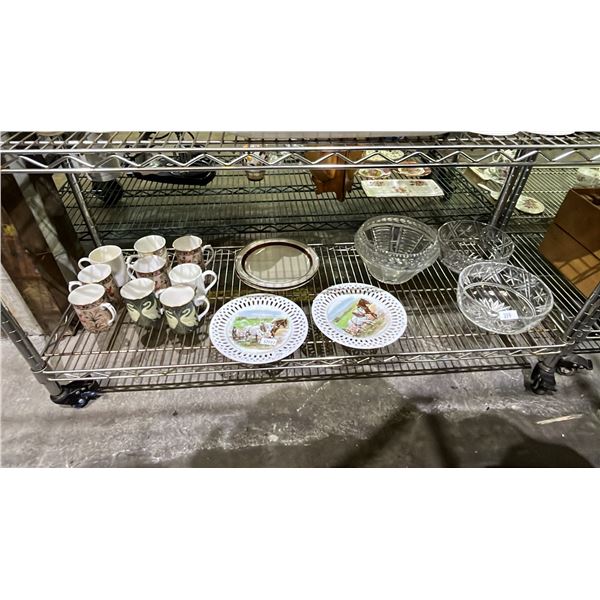 SHELF OF ASSORTED DINNERWARE INCLUDING; GLASS BOWLS, COLLECTIBLE PLATES, MUGS & MORE