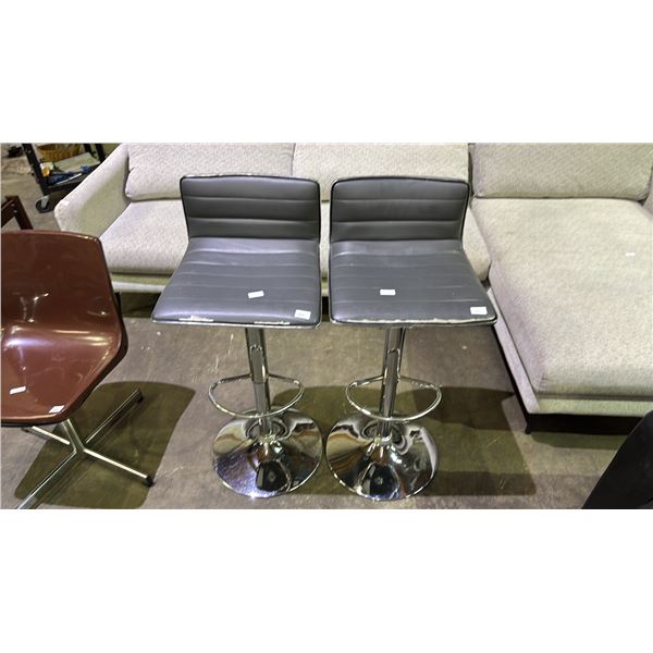 PAIR OF CHROME ADJUSTABLE BAR STOOLS (SEATS DAMAGED)