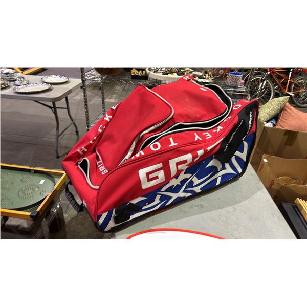 GRIT HOCKEY TOWER PORTABLE HOCKEY BAG WITH ASSORTED HOCKEY GEAR CONTENTS