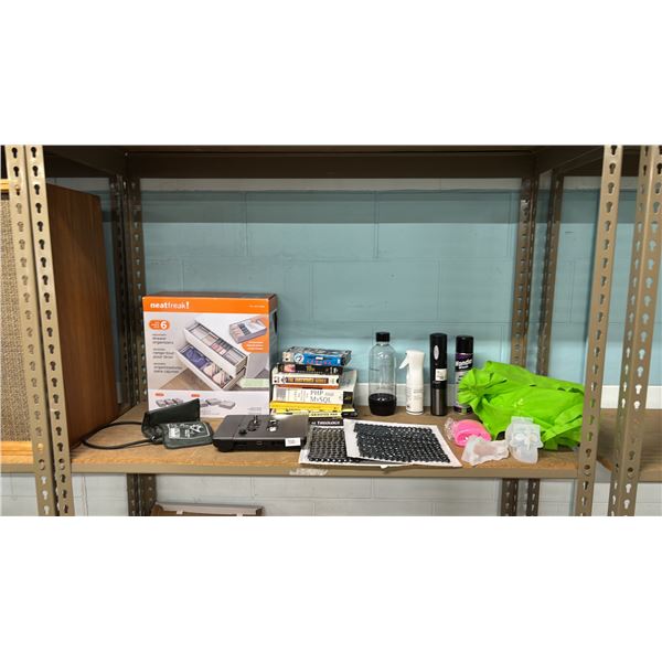 SHELF OF ASSORTED ITEMS INCLUDING; NEATFREAK ORGANIZER, SILICONE MOLDS, WIRELESS TURNTABLE REMOTE