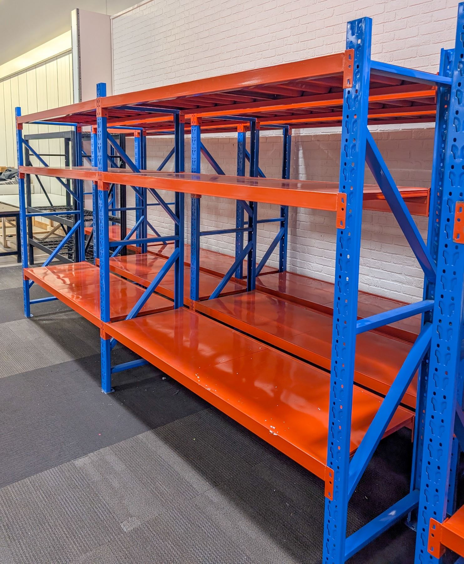 2 SECTIONS OF BLUE & ORANGE RACKING APPROX