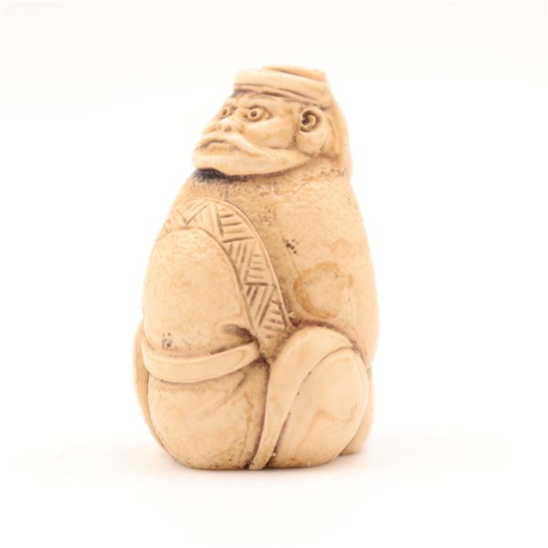 Carved Netsuke Figure of a Seated Man