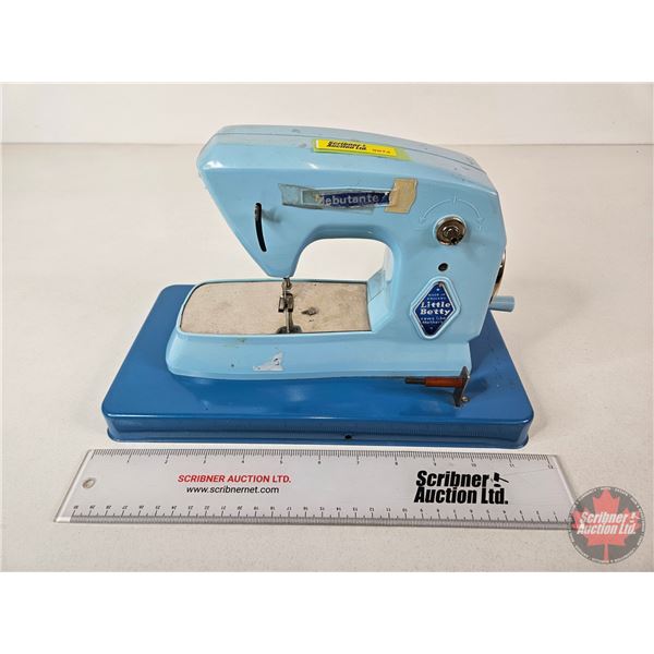 Little Betty Toy Sewing Machine  (7-1/2"H x 11-1/2"W x 6"D)