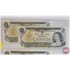 Image 2 : Canada $1 Bills 1973 (5): ~ Crow/Bouey #BAE2860464 ~ Crow/Bouey #BAJ8101187 ~ Crow/Bouey #AMF9614182
