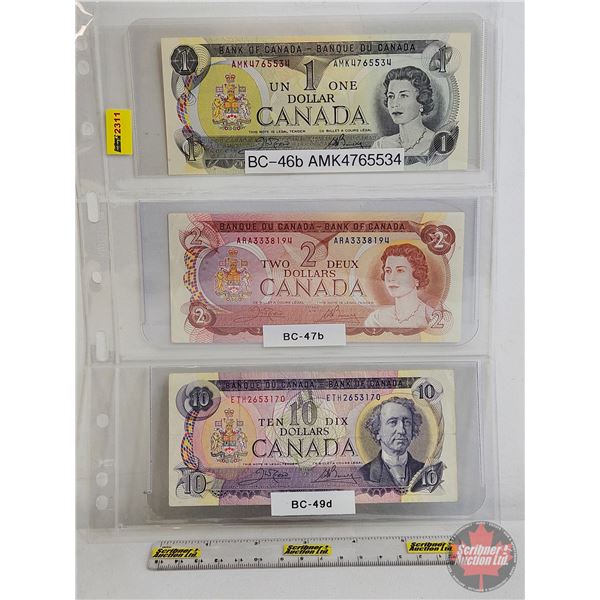 Canada Bills (3): - $1 Bill 1973 : Crow/Bouey #AMK4765534 - $2 Bill 1974 : Crow/Bouey #ARA3338194 - 