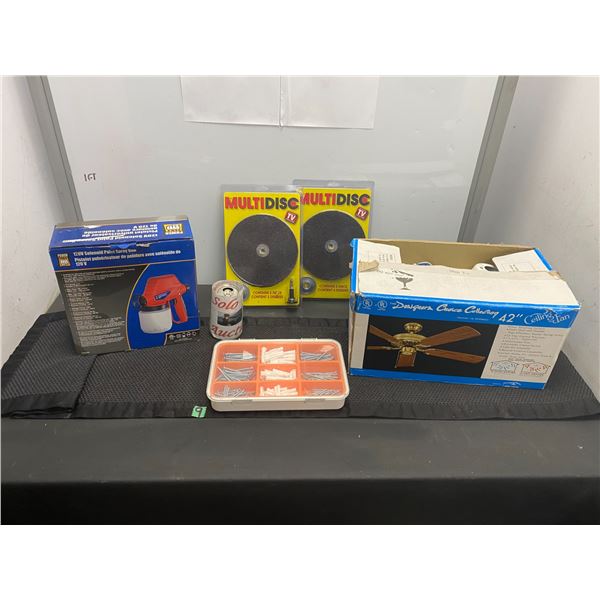 Assorted items including sanding discs, ceiling fan, paint spray gun and more