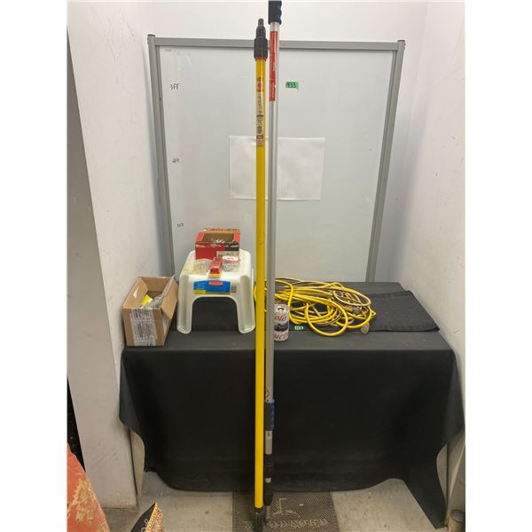 Assorted items including painting extension poles, electric chord, step stool and more