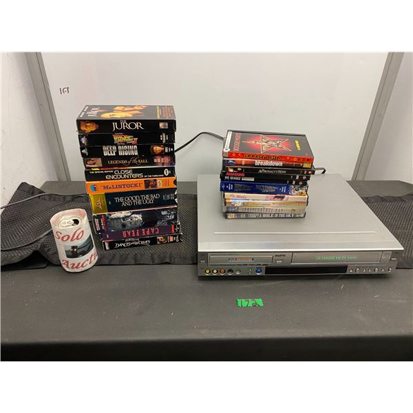 Sanyo brand DVD/VHS player and assorted DVD/VHS movies