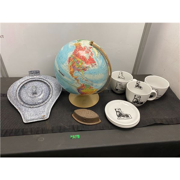 Desk top globe, ice skate themed coffee cups and plates, antique iron and more
