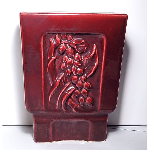 6)  HAND THROWN, GARNET COLORED "LILY OF