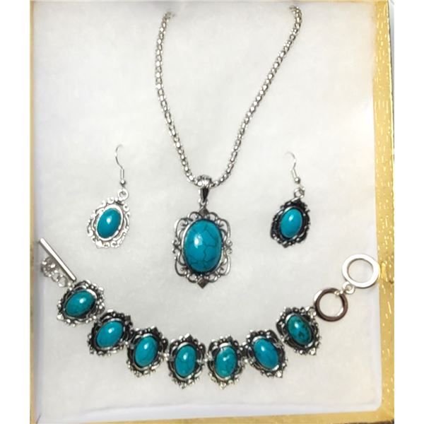 10)  SUITE OF SILVER TONE WITH OVAL